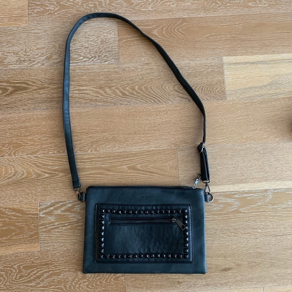 Black clutch with a handle by Laster